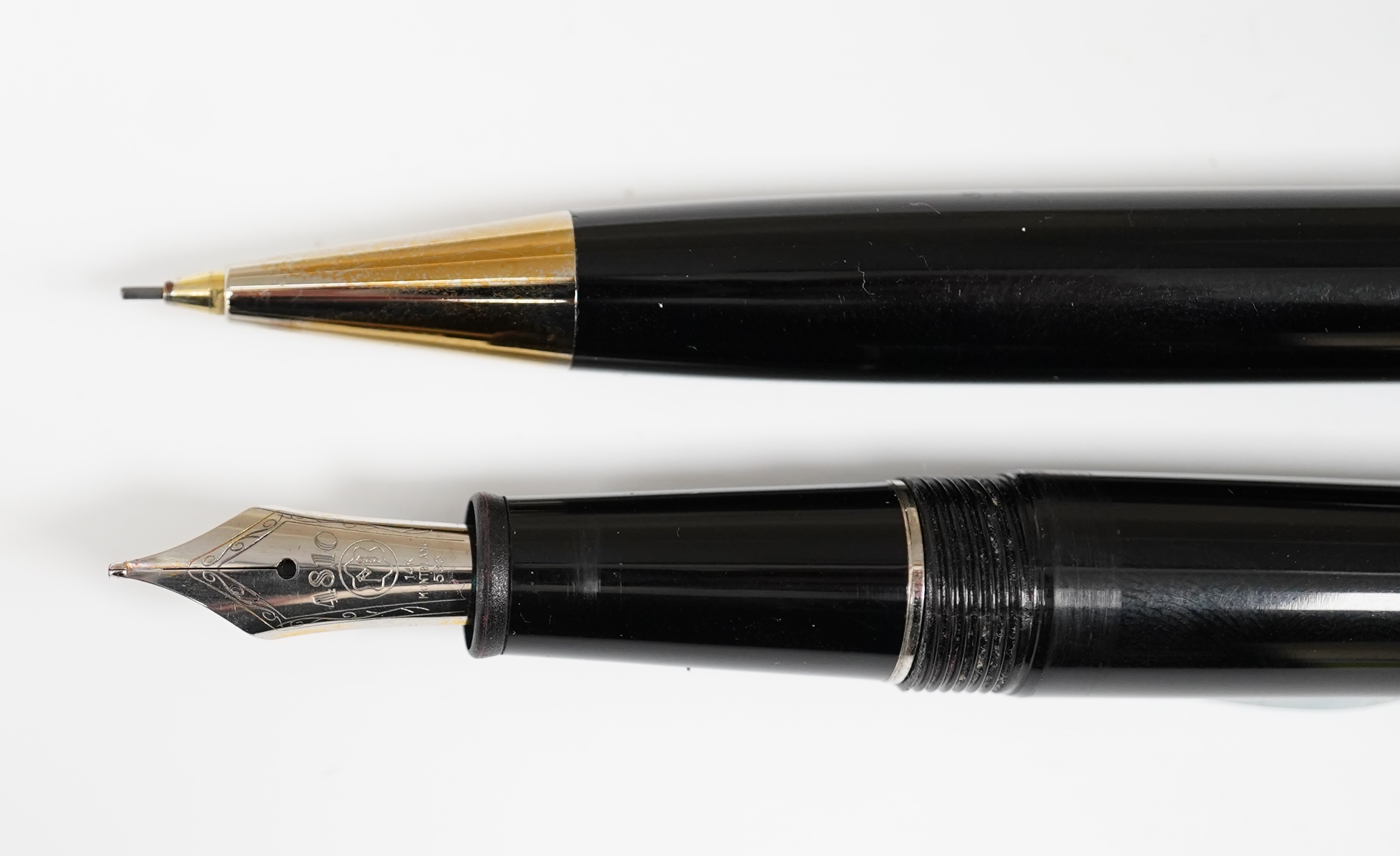 A Montblanc 145 fountain pen and a Montblanc pencil